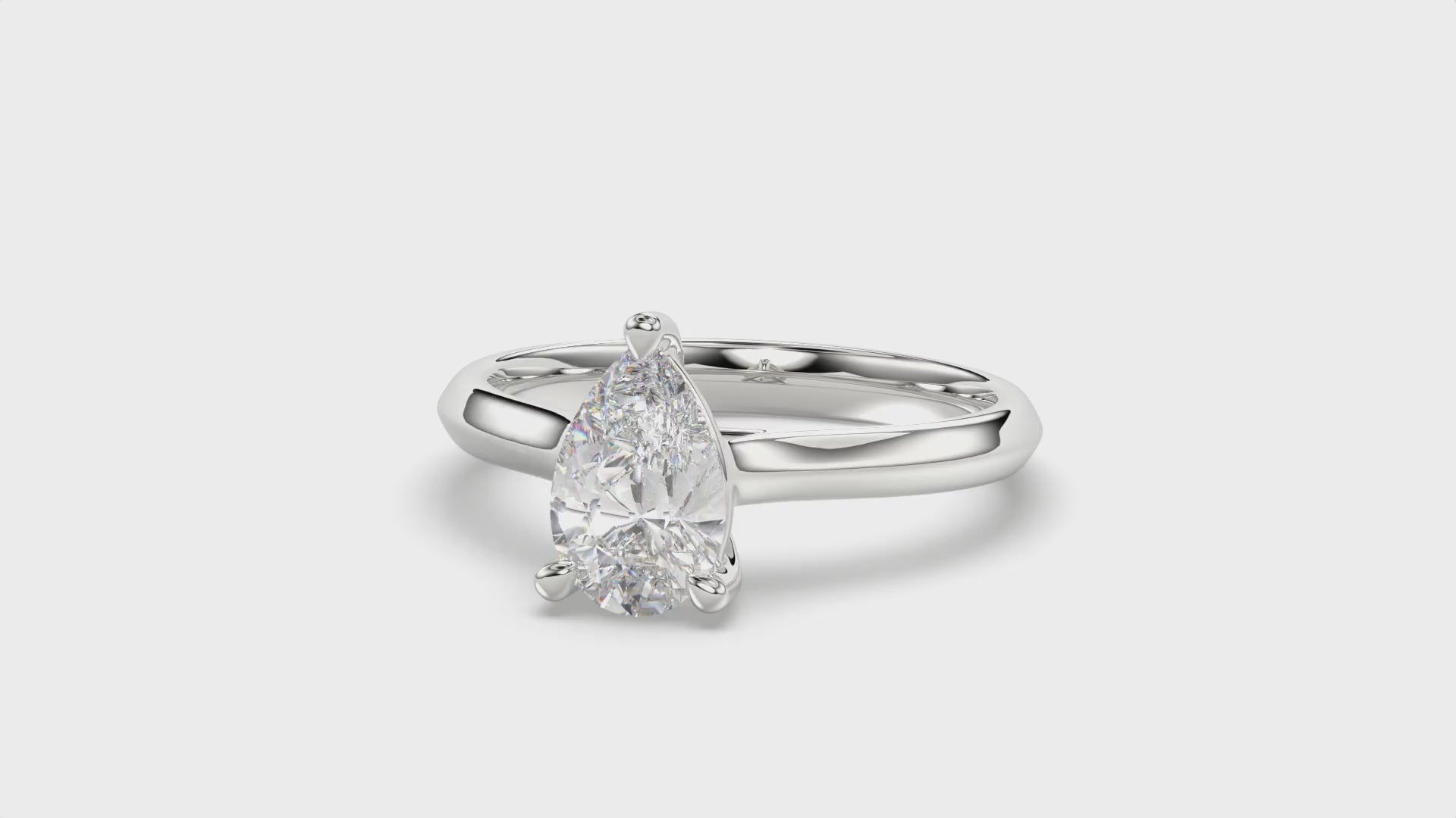 Solitaire Knife Edge Pear Diamond Ring - R162